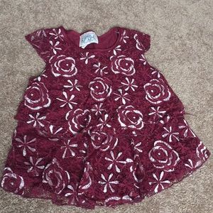 A maroon color  dress up blouse